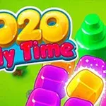 Színes 2020 Jelly Time felirat zöld háttéren, körülvéve színes, kocsonyás formákkal és faelemekkel
