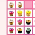 Rózsaszín háttérrel és négyzetes elrendezésben különböző színű és díszítésű cupcake-ek láthatók