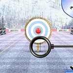 Íjász célkereszt, amely havas tájon egy céltáblára irányul