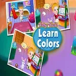 Gyermek színes képet tart egy szobában, más kisebb képekkel a háttérben és „Learn Colors” felirattal