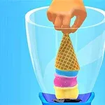 Egy kéz tölcséres fagyit helyez egy turmixgépbe