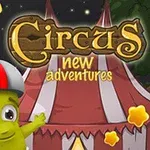 Egy zöld karakter sisakot visel egy piros-fehér cirkuszi sátor előtt, csillagokkal és a Circus new adventures felirattal