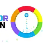 Színes gyűrű és Color Spin felirat, középen színes pöttyökkel és egy kék golyóval