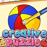 Egy színes festékes ecset, ami egy négy színű labdát színez, alatta a creative puzzle felirat látható élénk betűtípusban