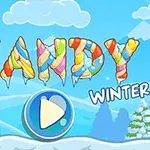 Színes cukorka betűkből álló Candy Winter felirat havas háttérrel és egy játékgombbal