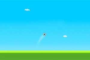 Egy futball-labda lebeg a kék ég alatt, néhány felhővel a háttérben és zöld fűvel az alján