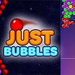 Színes golyók csoportosítva vannak a kép jobb oldalán, középen egy iránycsík mutat a kilövésre kész golyótól, bal oldalon a Just Bubbles szöveg látható