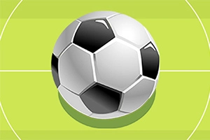 Fekete-fehér futball-labda egy zöld pálya háttérrel