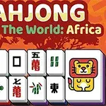 A mahjong köveken majom és oroszlán ikonok, valamint kínai karakterek láthatók, háttérben egy fa sziluettjével