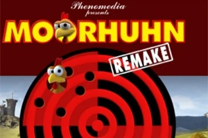 A képen egy színes céltábla látható egy kakas fejjel a közepén, a háttérben tájjal, a tetején Moorhuhn Remake felirattal