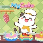 Egy boldog macska séf sapkában áll különböző, színes torták előtt egy konyhában, a háttérben MyCake felirattal