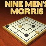 Fából készült felületen elhelyezett társasjáték tábla fekete és barna korongokkal, felette Nine Mens Morris felirat látható