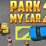 Kék autó parkolóhelyen, körülötte ládák és bóják