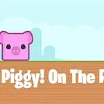 Egy rózsaszín, kocka alakú malac figura egy barna, zárt ajtó előtt, felirattal: Piggy!