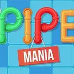 Színes csövekből kirakott PIPE felirat a kék csempés háttér előtt, alatta egy piros táblán a MANIA szó