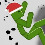 Zöld botfigura mikulássapkában elesik, körülötte fekete törmelékek