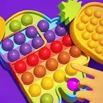 Színes pop it játék sárga, piros, zöld és kék buborékokkal, amelyekből egy kéz egyet benyom