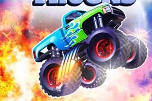 Egy színes, nagy kerekű monster truck emelkedik a levegőbe lángokkal a háttérben