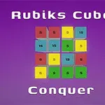 Színes, számozott kockákból álló négyzetminta lila háttér előtt, Rubiks Cube Conquer felirattal