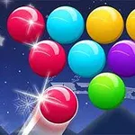Színes golyók vannak csillagokkal és hópelyhekkel díszített éjszakai háttér előtt, egy piros golyóval a célkeresztben