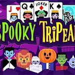 Színes, rajzfilm-szerű karaktereket ábrázoló kép, köztük vámpírt, múmiát, töklámpást és szellemet; kártyalapok és a Spooky TriPeaks felirat középen, lilás háttérrel