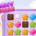 Színes cukorkák és édességek egy négyzetrácsos táblán, háttérben a Sweet Crush felirattal