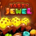Színes és élénk képen három kalácsszerű fagylaltgombóc látható csokoládészórással, körülötte különféle édes cukorkák, a háttérben „Tasty Jewel” felirattal