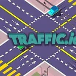 Forgalmas útkereszteződés felülnézetből, közepén TRAFFIC