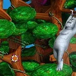 Egy szürke majom lóg egy fán a sűrű, zöld levelű erdőben